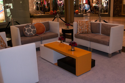 Mall Lounge with Tan Sofas and Orange Table